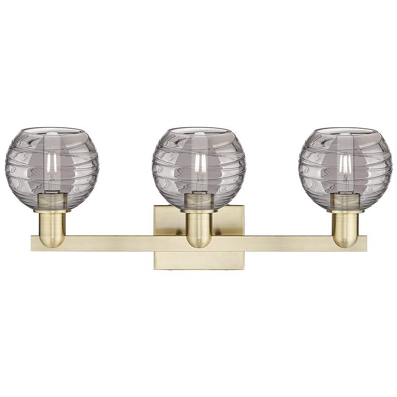Image 2 Athens Deco Swirl 26"W 3 Light Antique Brass Bath Light w/ Smoke Shade more views