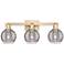 Athens Deco Swirl 26"W 3 Light Champagne Bath Light w/ Smoke Shade