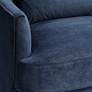 Austen Navy Velvet Tufted Armchair with Pillow in scene