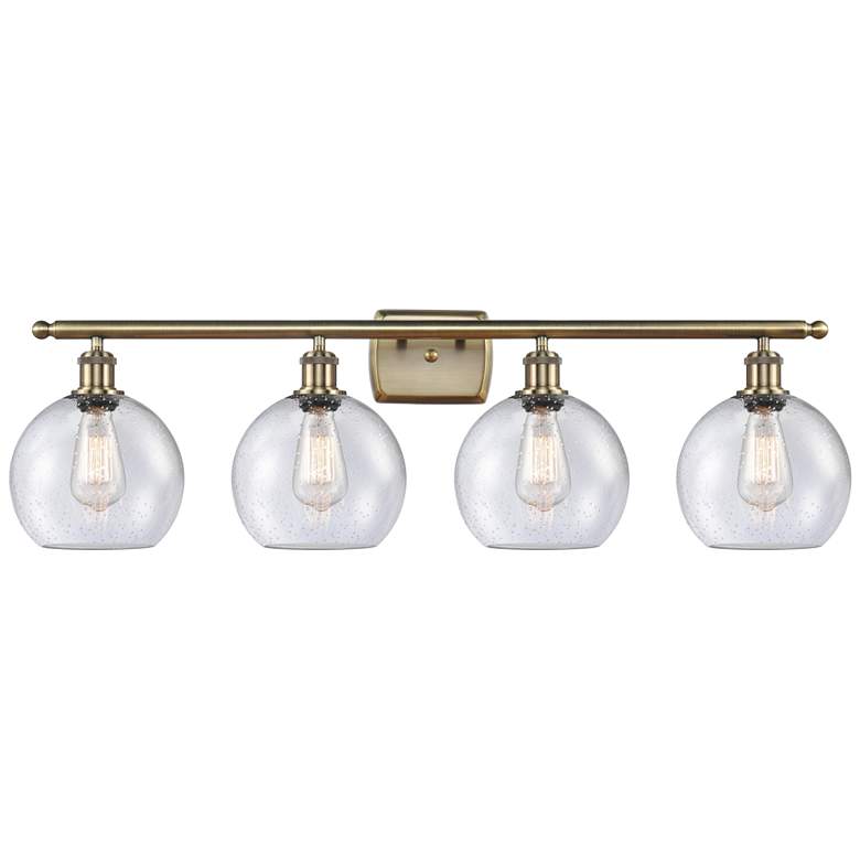 Image 1 Ballston Athens 8" 4 Light 36" Bath Light - Antique Brass - Seedy