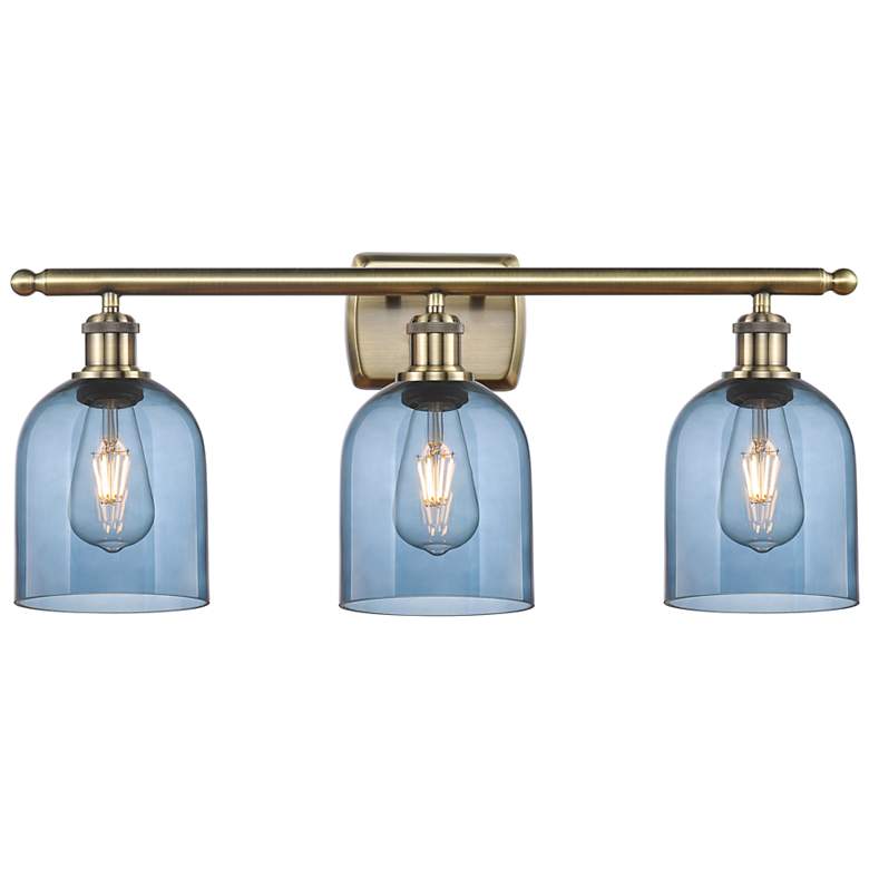 Image 1 Ballston Bella 25.5"W 3 Light Antique Brass Bath Light w/ Blue Shade