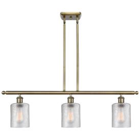 Ballston Cobbleskill 36"W 3 Light Antique Brass Island Light w/ Clear Ballston Cobbleskill 36"W 3 Light Antique Brass Island Light w/ Clear