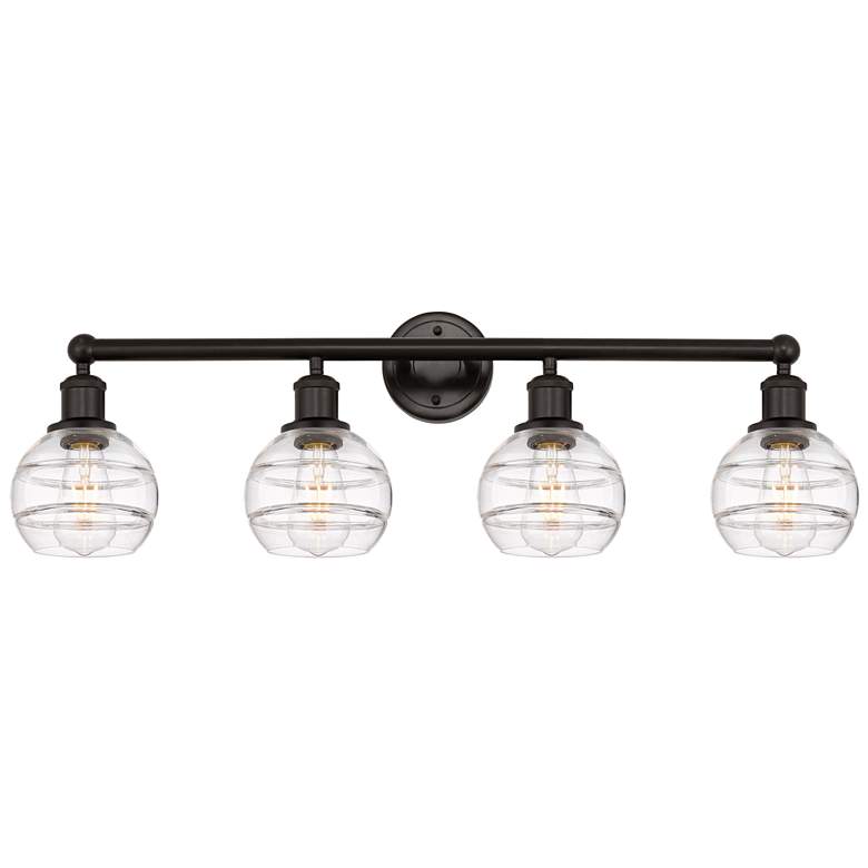 Image 1 Ballston Vaz 11.63"H Oiled Bronze Adjustable Sconce w/ Blue Shade