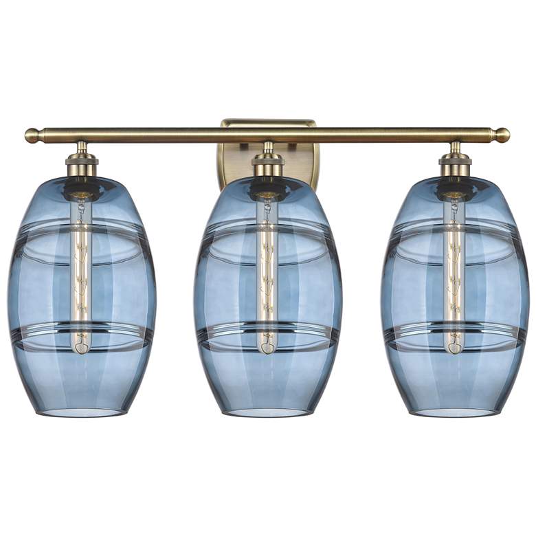 Image 1 Ballston Vaz 28"W 3 Light Antique Brass Bath Light w/ 8" Blue Sha