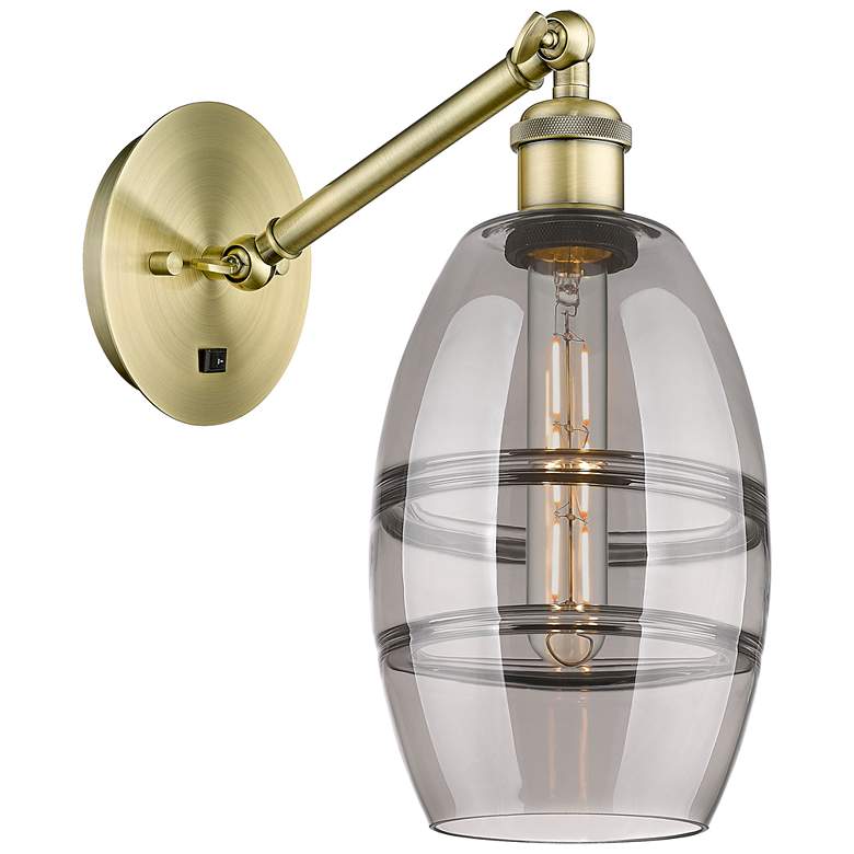 Image 1 Ballston Vaz 8.13"H Antique Brass Adjustable Sconce w/ Smoke Shade