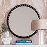 Baria Painted Black Wooden Beaded 30" Round Wall Mirror in scene