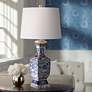 Barnes and Ivy Floral Pattern Iris Blue and White Porcelain Table Lamp in scene