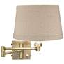 Barnes and Ivy Natural Linen Drum Shade Brass Plug-In Swing Arm Wall Lamp
