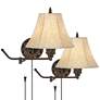 Barnes and Ivy Rosslyn Bronze Plug-In Swing Arm Wall Lamps Set of 2 in scene