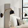 1_Barnes and Ivy Sania Black and Antique Brass Swing Arm Wall Lamps Set of 2