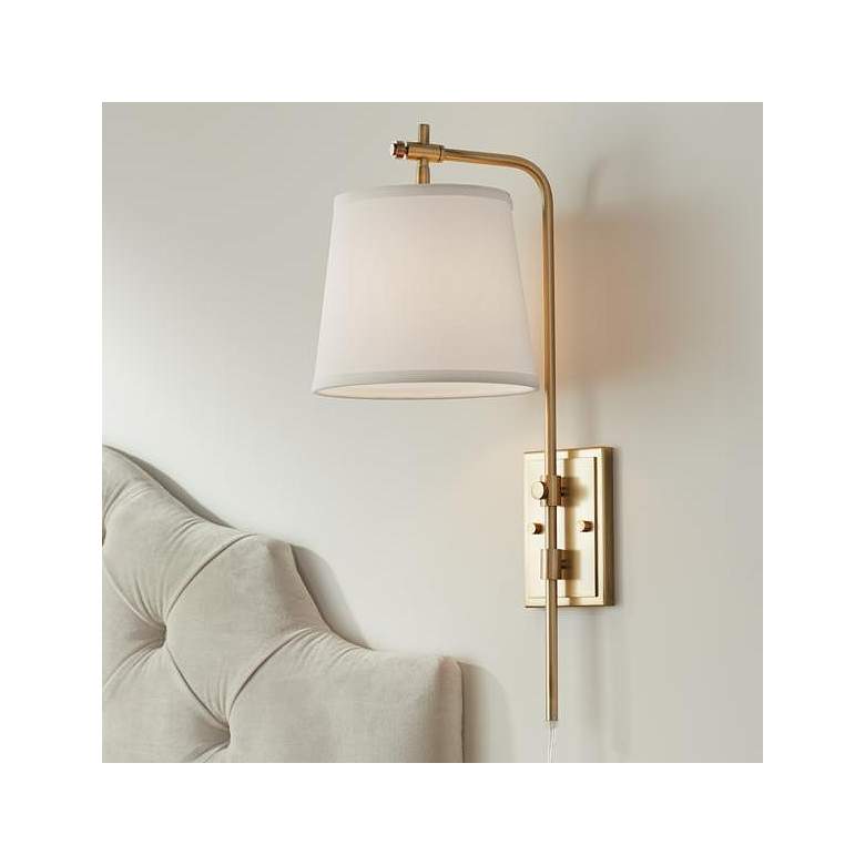 Image 1 Barnes and Ivy Seline Warm Gold Adjustable Plug-In Wall Lamp with Dimmer