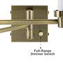 3_Barnes and Ivy Tan Shade Antique Brass Plug-In Swing Arm Wall Light more views