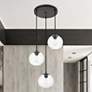 Baxter 3 Lts Black Pendant With Clear Glass in scene