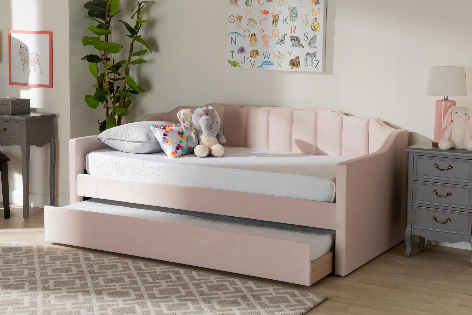 Baxton Studio Lennon Twin Size Pink Daybed with Trundle in scene