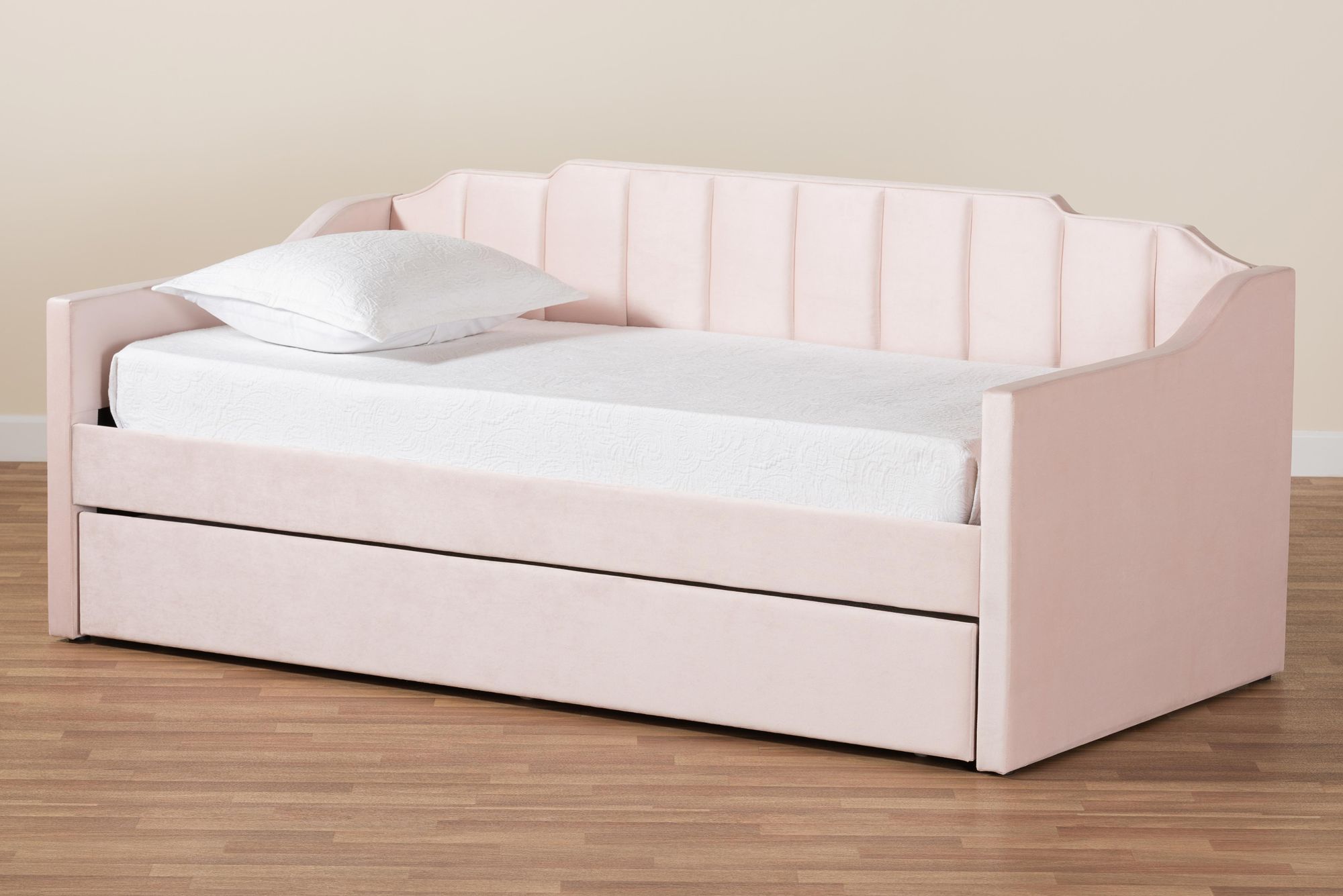 Baxton Studio Lennon Twin Size Pink Daybed with Trundle in scene