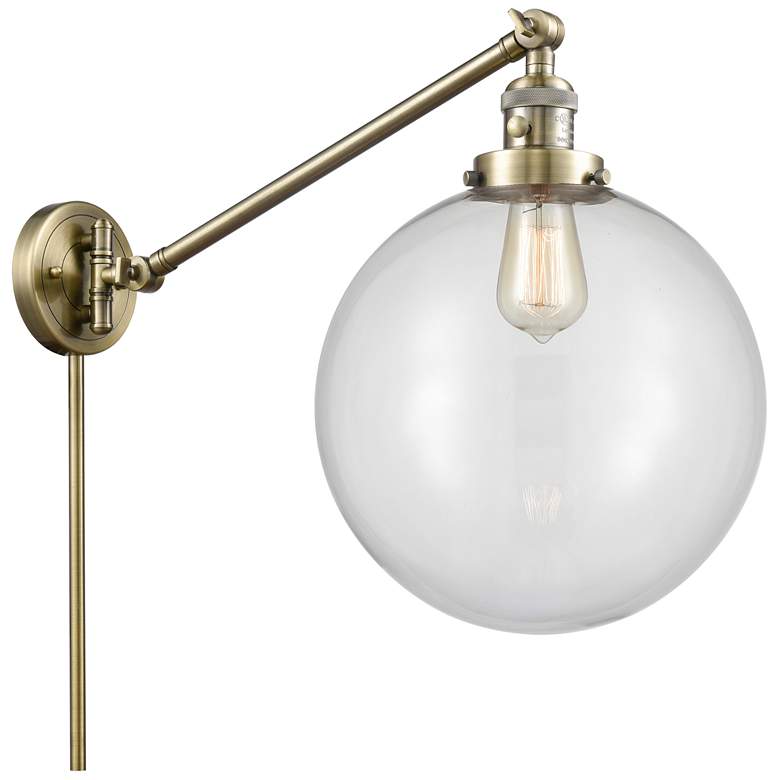 Image 1 Beacon 12 inch Antique Brass LED Swing Arm With Clear Shade