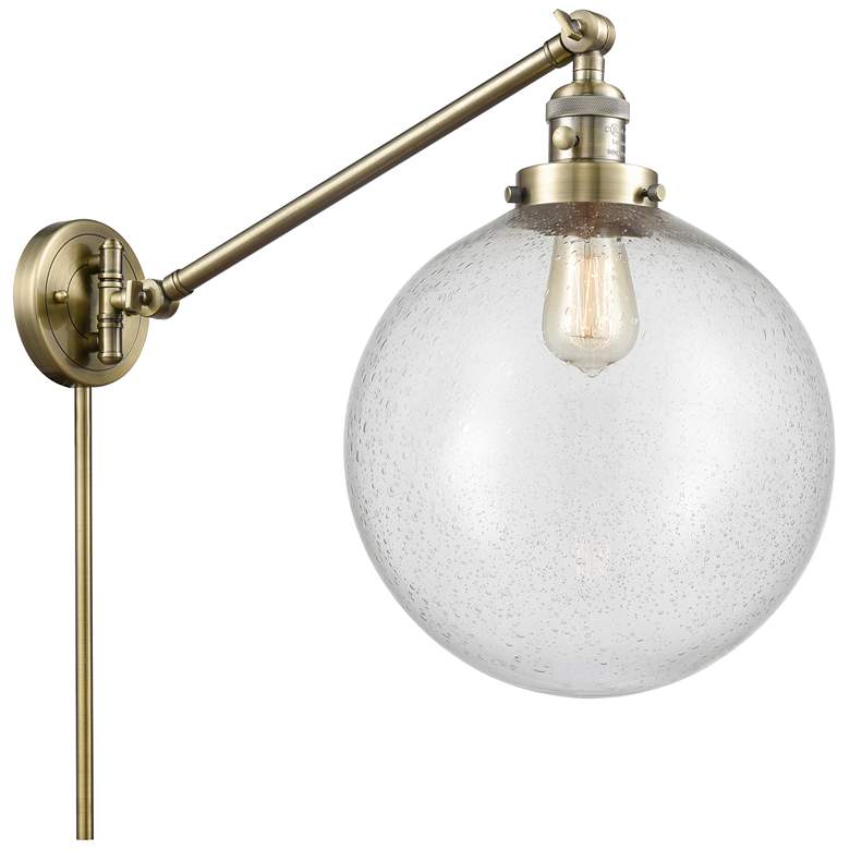 Image 1 Beacon 12" Antique Brass LED Swing Arm With Seedy Shade