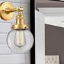 5_Beacon 12" High Satin Gold Wall Sconce with Clear Glass more views