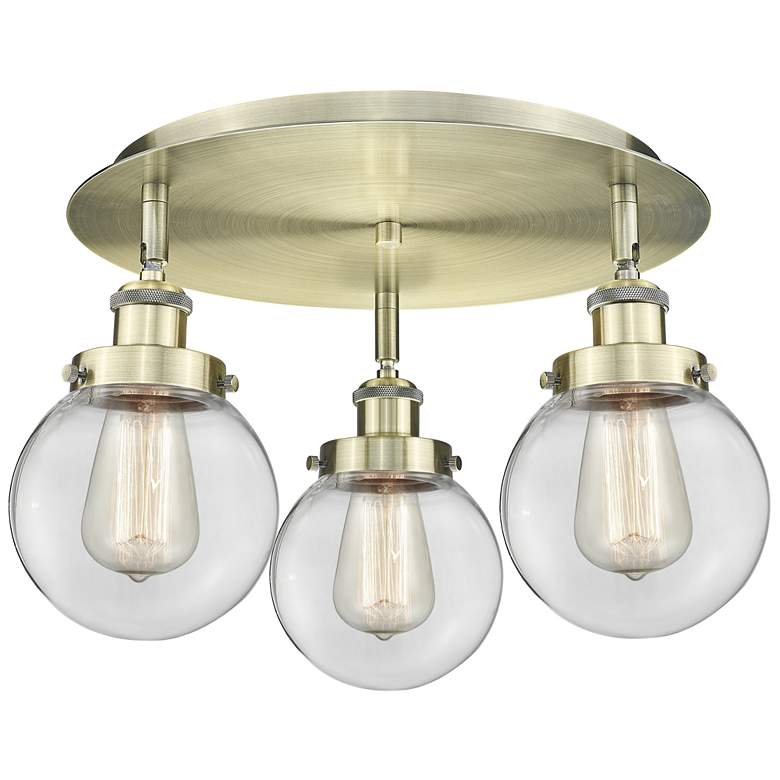 Image 1 Beacon 17.75" Wide 3 Light Antique Brass Flush Mount With Clear Glass