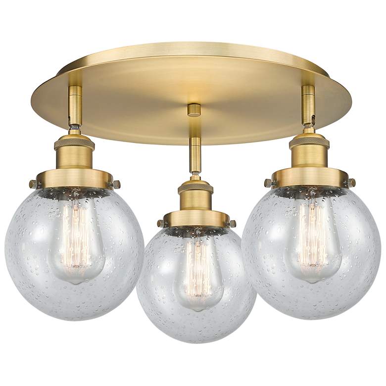 Image 1 Beacon 17.75" Wide 3 Light Brushed Brass Flush Mount With Seedy Glass