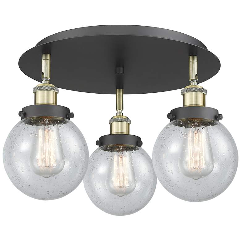 Image 1 Beacon 17.75"W 3 Light Black Antique Brass Flush Mount w/ Seedy Glass