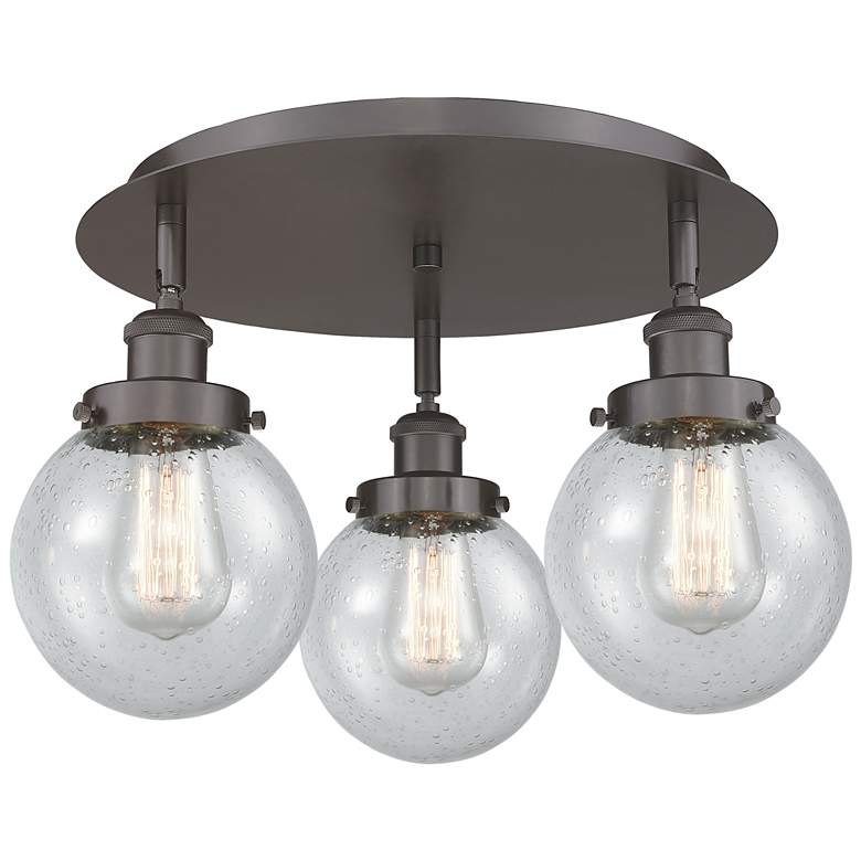 Image 1 Beacon 17.75"W 3 Light Oil Rubbed Bronze Flush Mount With Seedy Glass