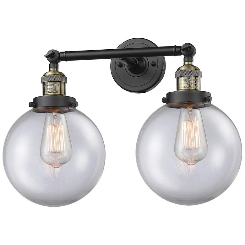Image 1 Beacon 19" 2-Light Black Antique Brass Bath Light w/ Clear Shade