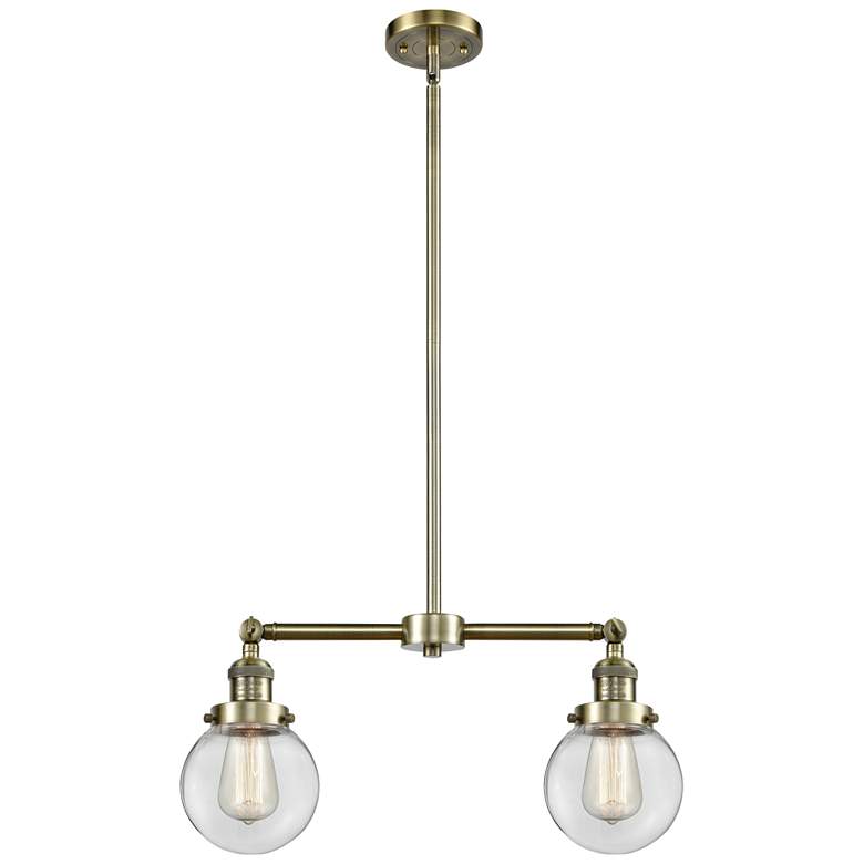 Image 1 Beacon - 2 Light 23" LED Island Light - Antique Brass - Clear Shade