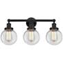 1_Beacon 24" Wide Matte Black Clear Glass 3-Light Bath Light