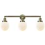 Beacon 3 Light 30" Bath Light - Antique Brass - Matte White Shade