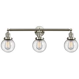 Image1 of Beacon 3 Light 30" Bath Light - Brushed Satin Nickel - Seedy Shade