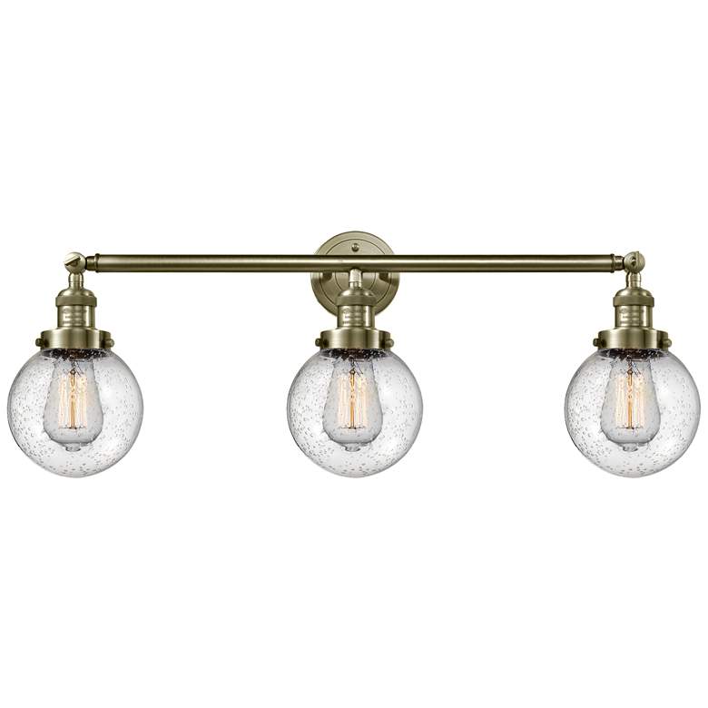 Image 1 Beacon 3 Light 30" LED Bath Light - Antique Brass - Seedy Shade