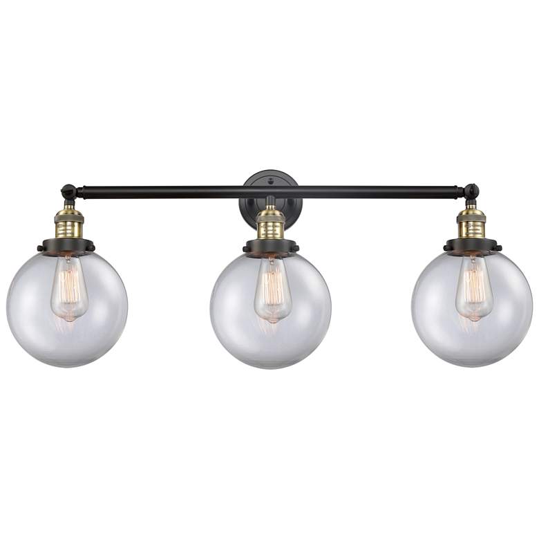 Image 1 Beacon 3 Light 32" Bath Light - Black Antique Brass - Clear Shade