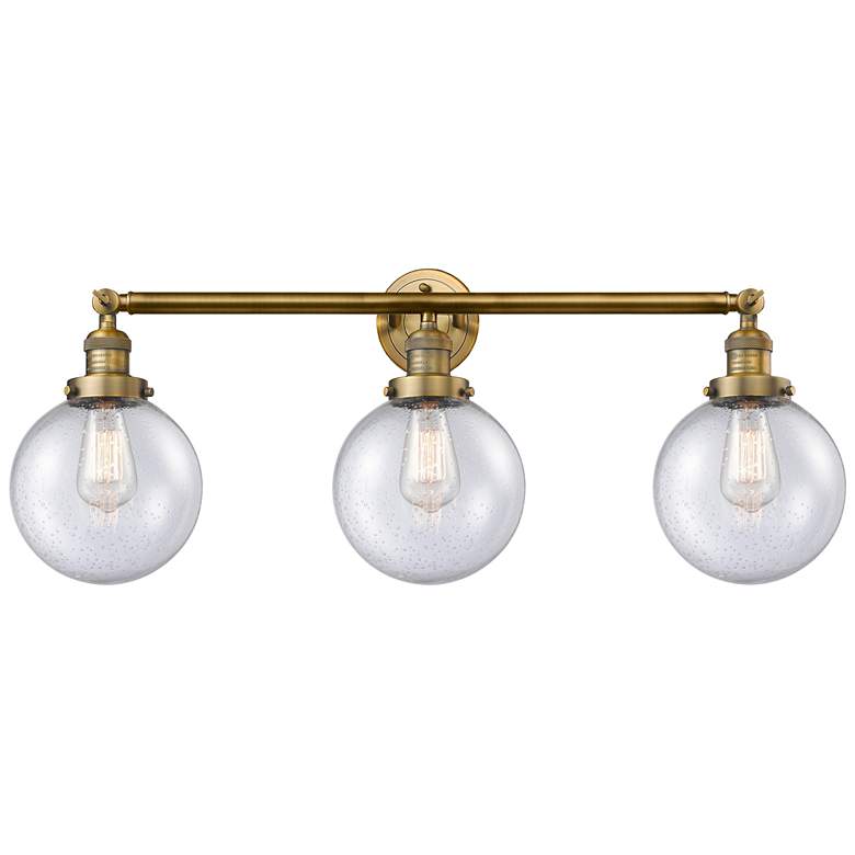 Image 1 Beacon 3 Light 32" Bath Light - Brushed Brass - Seedy Shade