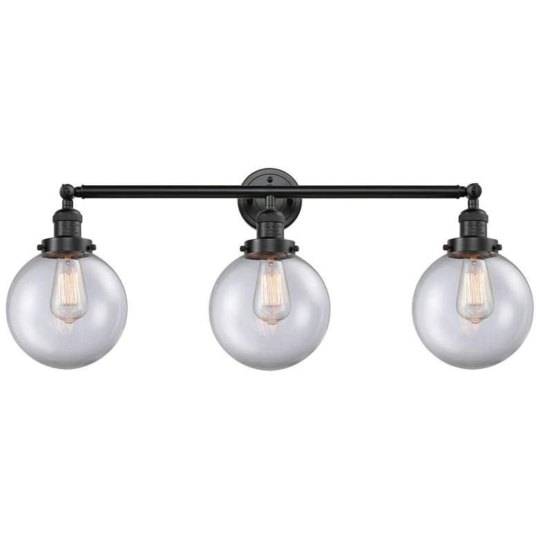 Image 1 Beacon 3 Light 32" Bath Light - Oil Rubbed Bronze - Clear Shade