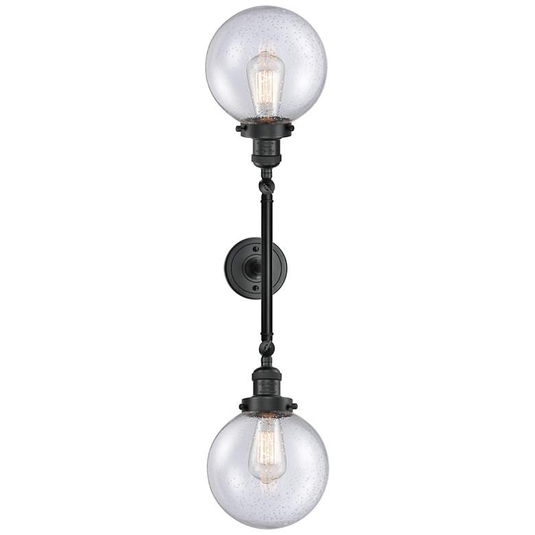 Image 1 Beacon 34 1/2"H Black 2-Light Wall Sconce with Seedy Glass
