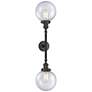 1_Beacon 34 1/2"H Black 2-Light Wall Sconce with Seedy Glass