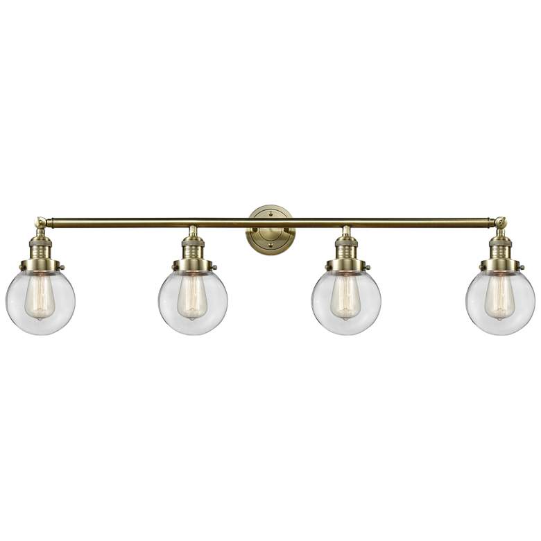 Image 1 Beacon 4 Light 42" Bath Light - Antique Brass - Clear Shade
