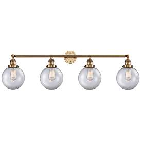 Image1 of Beacon 4 Light 44" LED Bath Light - Brushed Brass - Clear Shade