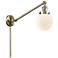Beacon 6" Antique Brass Swing Arm With Matte White Shade