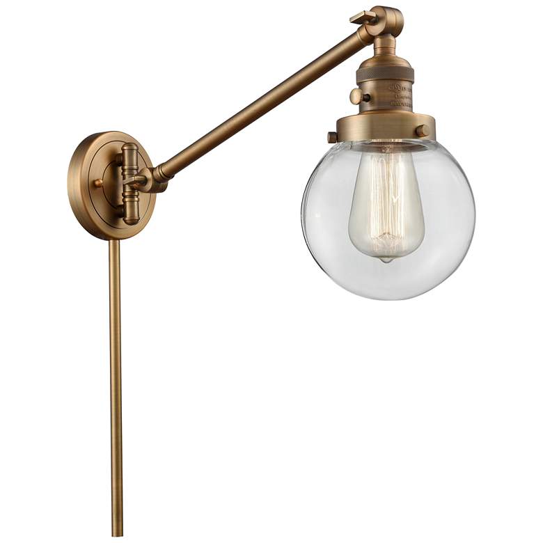 Image 1 Beacon 6 inch Brushed Brass LED Swing Arm With Clear Shade