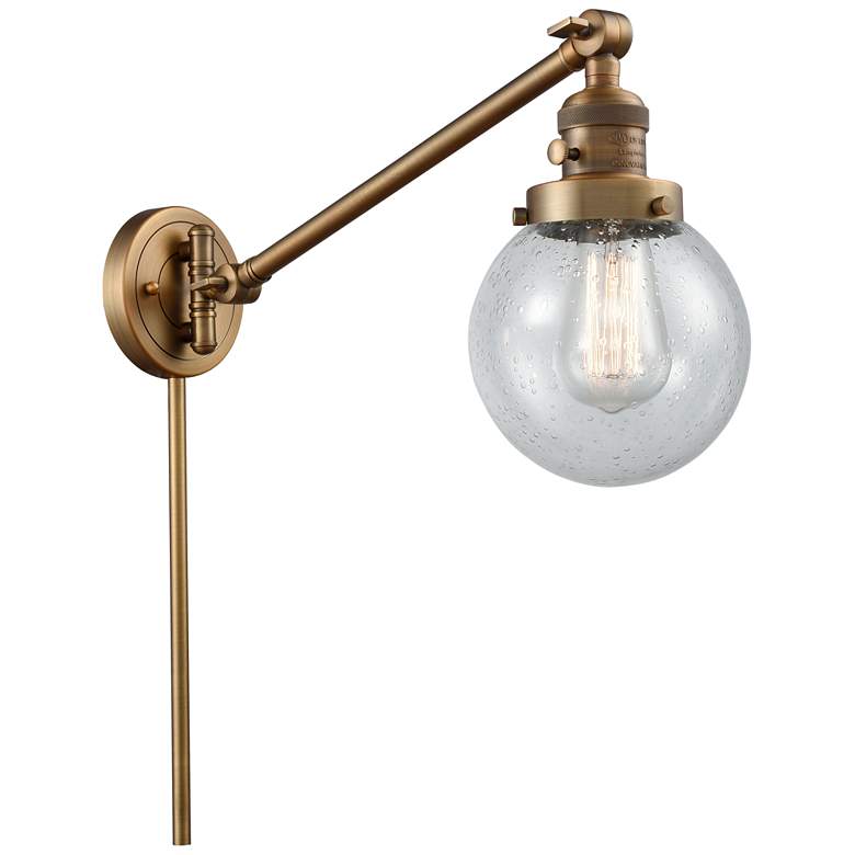 Image 1 Beacon 6 inch Brushed Brass LED Swing Arm With Seedy Shade