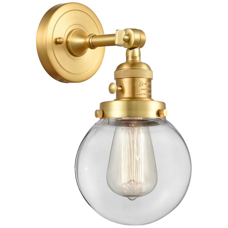 Image 1 Beacon 6" Satin Gold Sconce w/ Clear Shade