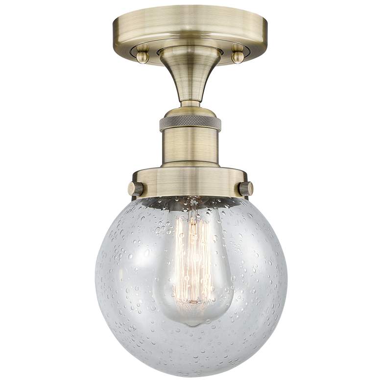 Image 1 Beacon 6" Wide Antique Brass Semi.Flush Mount With Seedy Glass Shade
