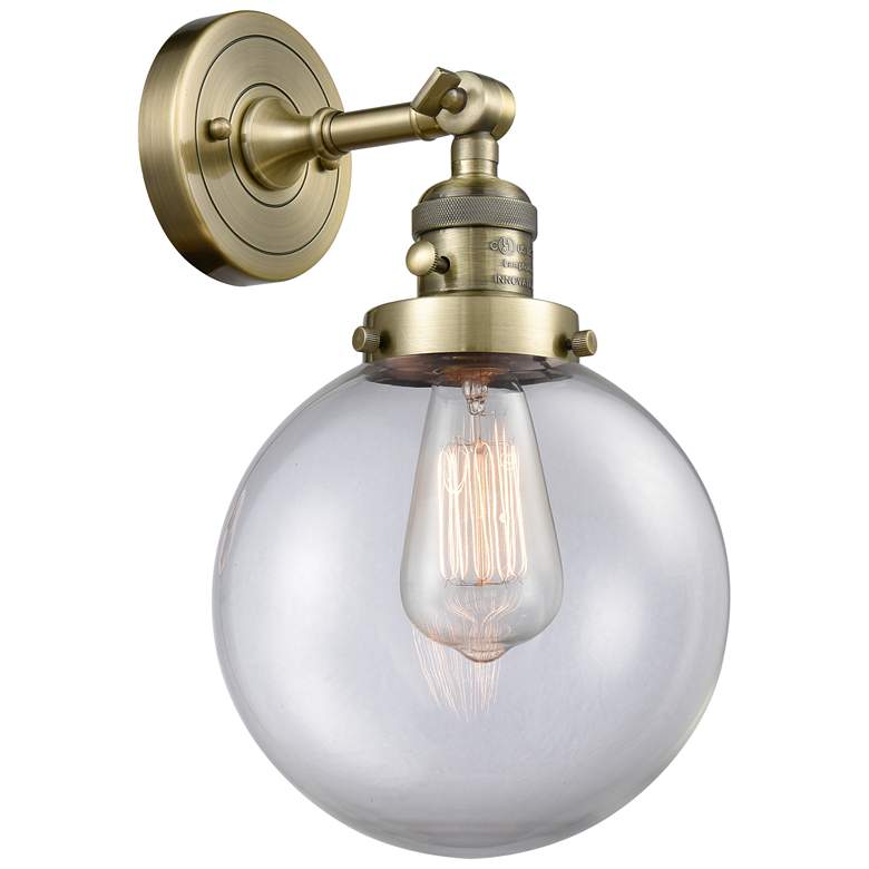 Image 1 Beacon 8" Antique Brass Sconce w/ Clear Shade