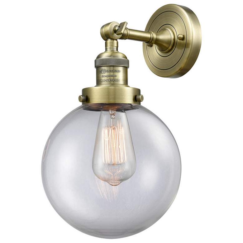Image 1 Beacon 8" Antique Brass Sconce w/ Clear Shade