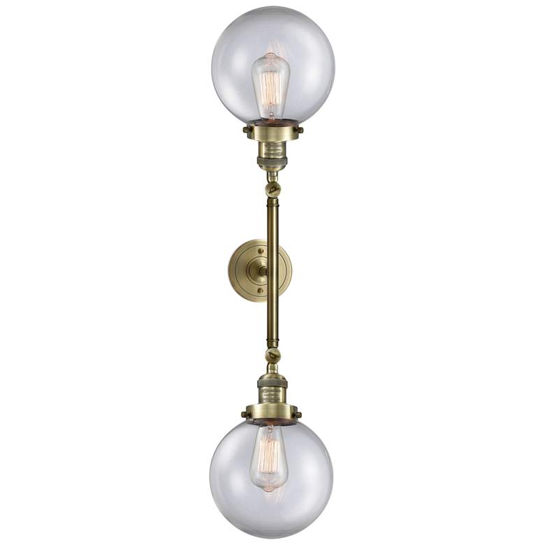 Image 1 Beacon 8" Wide 2 Light Antique Brass Bath Vanity Light w/ Clear Shade