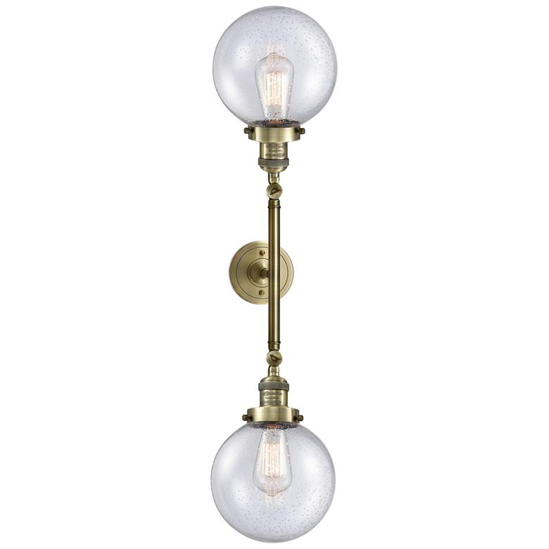 Image 1 Beacon 8" Wide 2 Light Antique Brass Bath Vanity Light w/ Seedy Shade