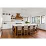 Beau 56" Wide Polished Nickel 9-Light Linear Chandelier in scene