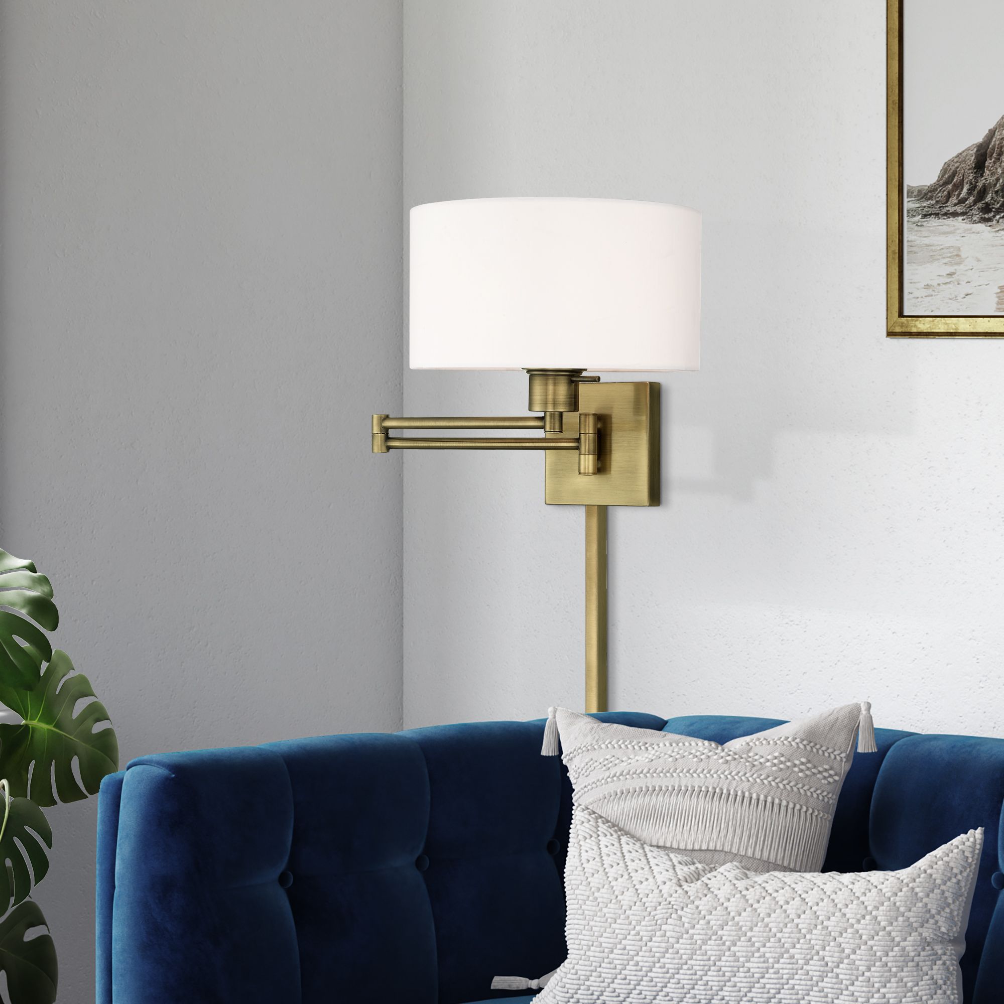 Beauchamp Antique Brass Swing Arm Wall Lamp in scene